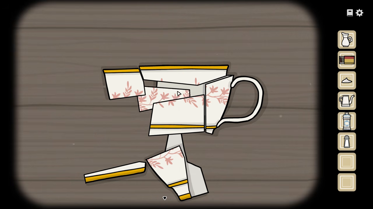 Broken teacup pieces in Alexandra's tea task